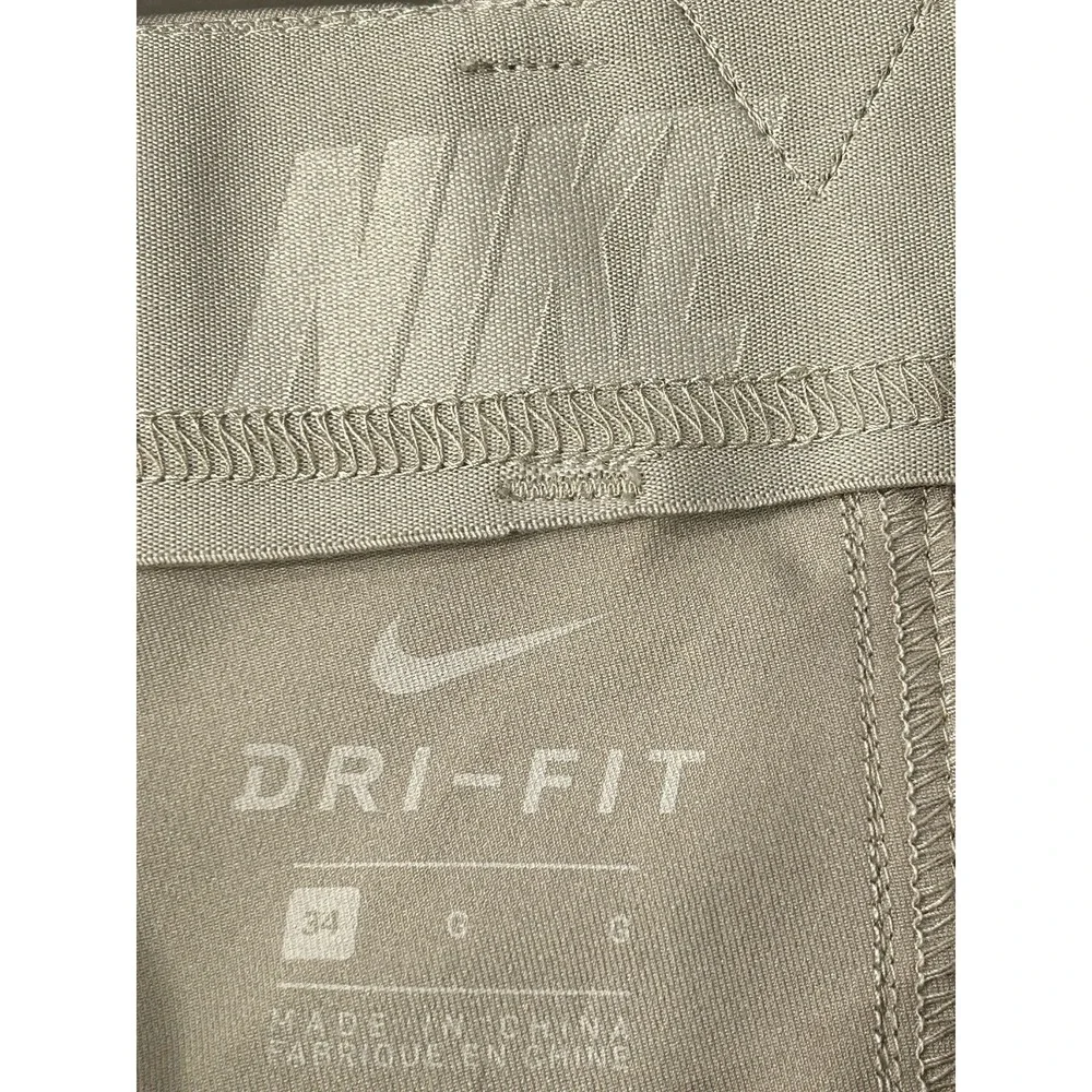 Nike Golf Dri-FIT Men's Performance Pants Khaki Tan Flat Front Size 34x27.5 Golf